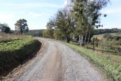 Javna pot JP620-411 v Markovcih mimo pokopališča 1